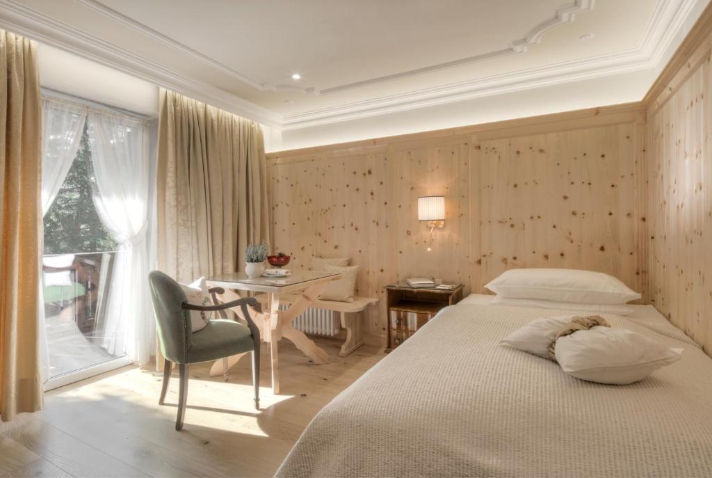 Posteľ alebo postele v izbe v ubytovaní Hotel La Perla: The Leading Hotels of the World