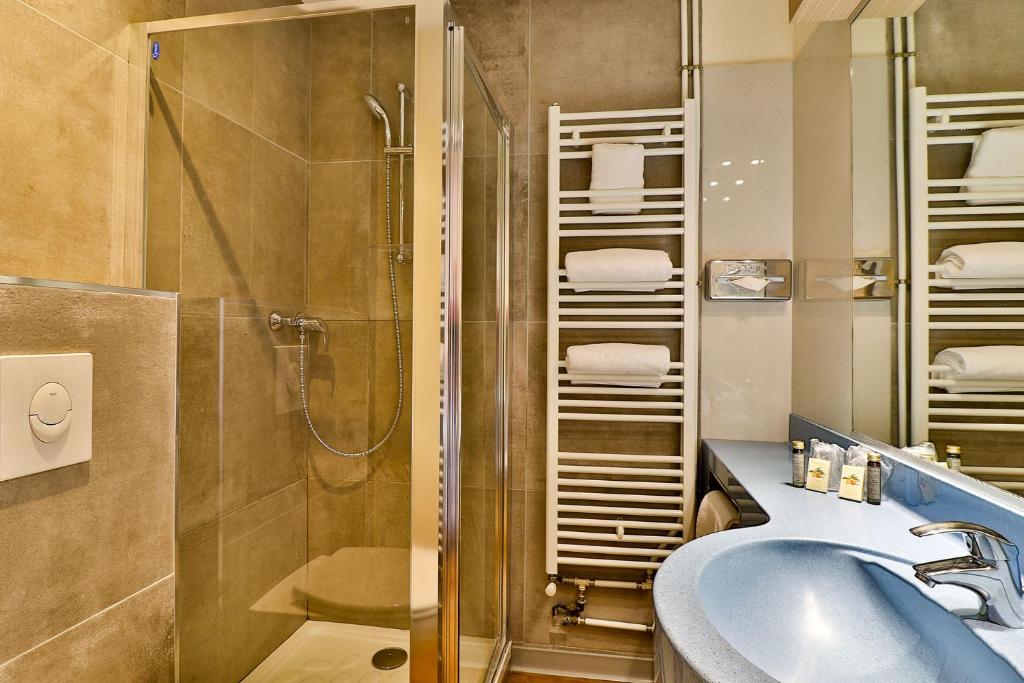 Koupelna v ubytování Hôtel Provençal