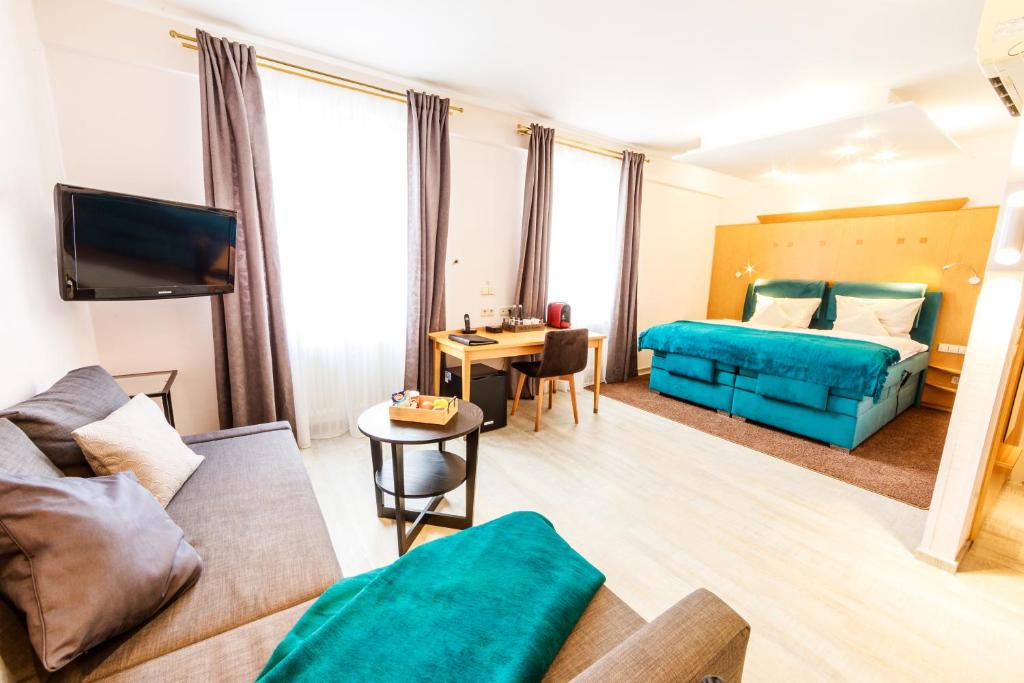Postel nebo postele na pokoji v ubytování Kaiserhof