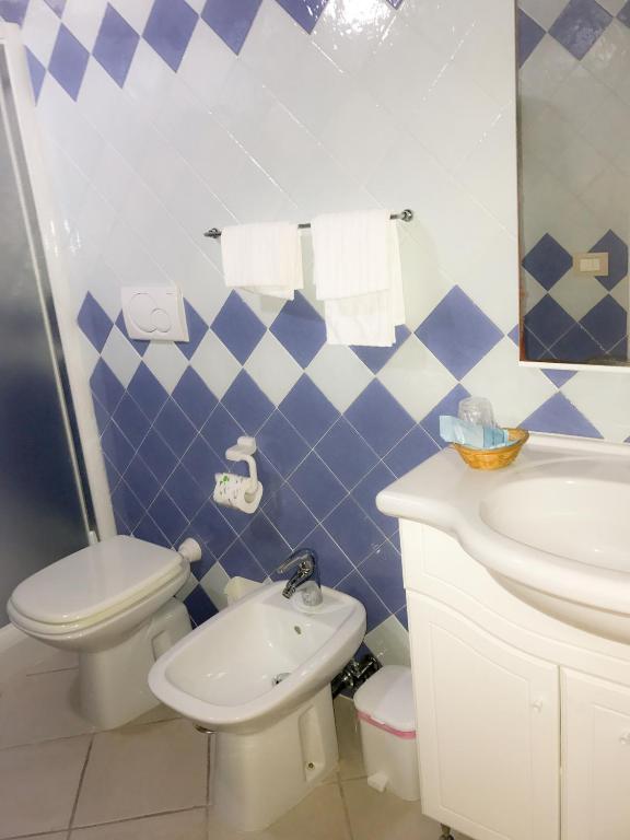 Koupelna v ubytování Hotel La Nave