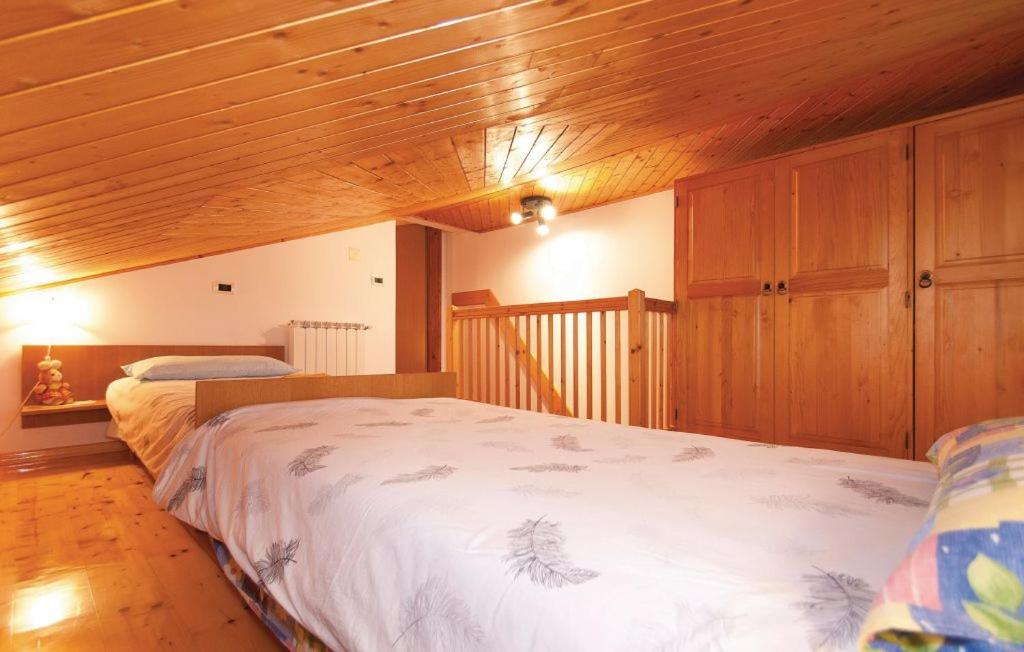 Postel nebo postele na pokoji v ubytování Apartman Pokrajac Twin