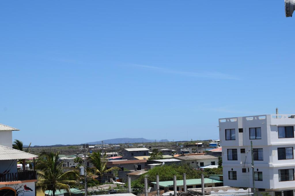 a view of a city from a building at Paraiso de Isabela in Puerto Villamil