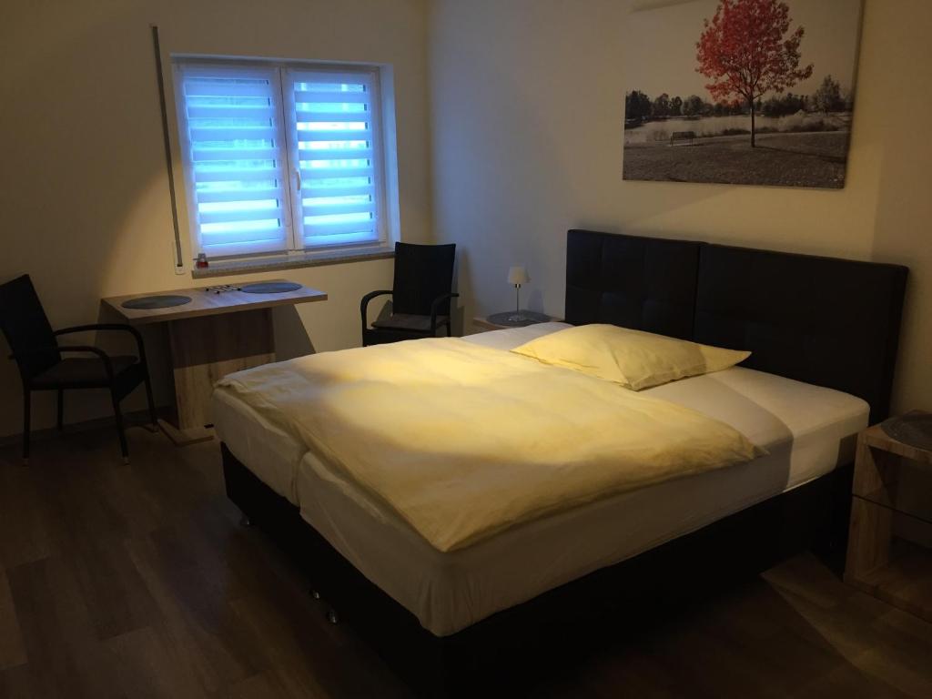 Tempat tidur dalam kamar di Boardinghaus Modern Living