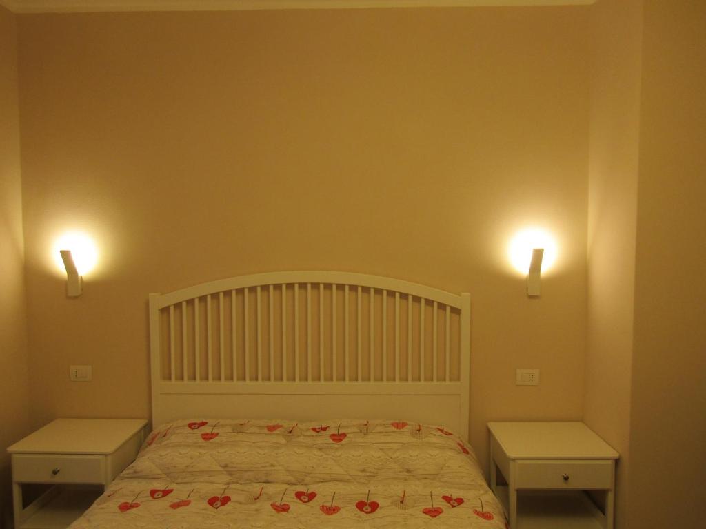 Postel nebo postele na pokoji v ubytování Glam Resort Giulia