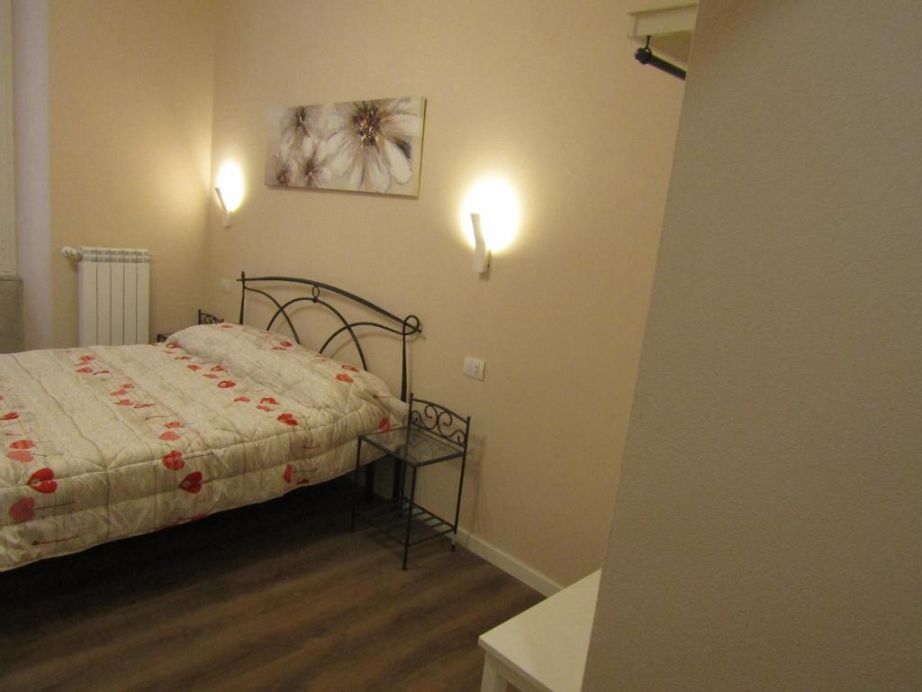 Postel nebo postele na pokoji v ubytování Glam Resort Giulia