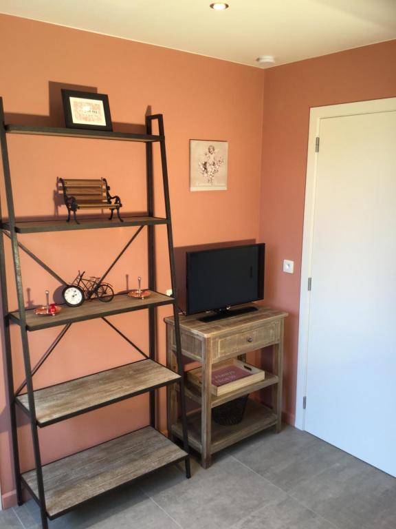 TV a/nebo společenská místnost v ubytování B&B 22