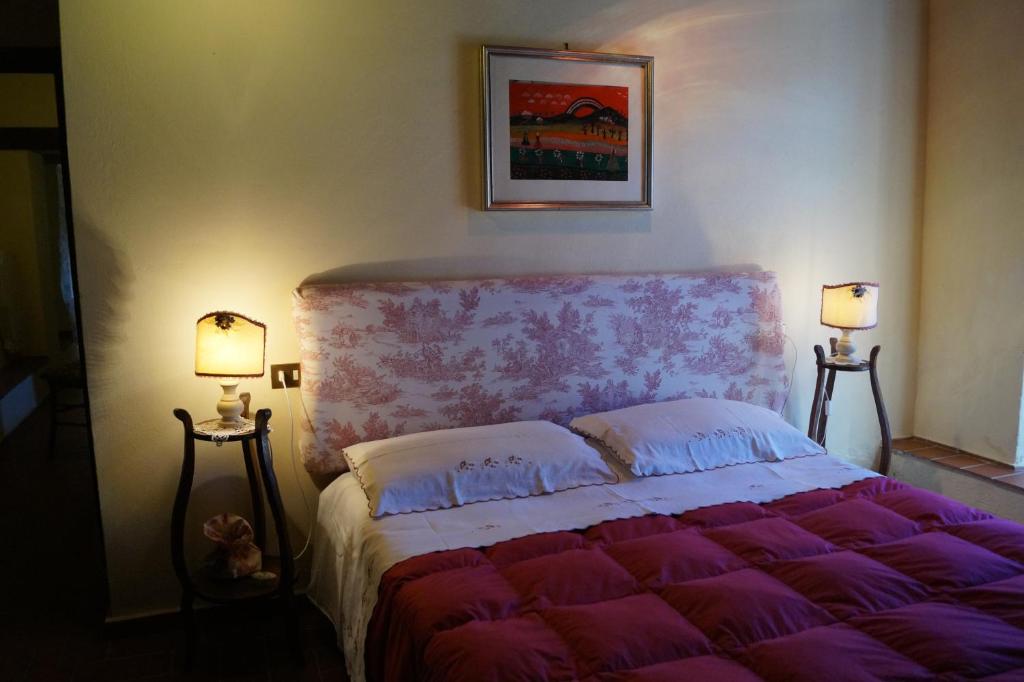 A bed or beds in a room at Agriturismo Bonzalone