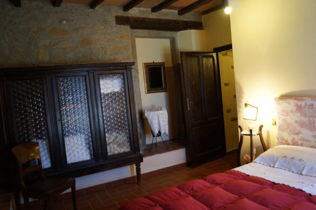 A bed or beds in a room at Agriturismo Bonzalone