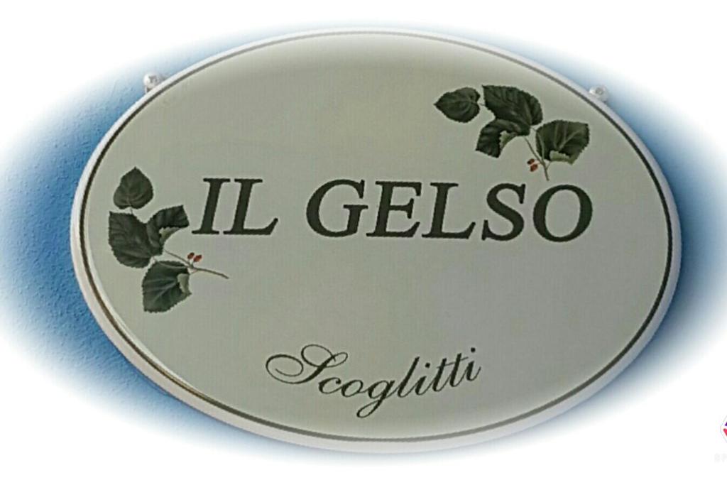 a plate with the words il gellosso positivo di Appartamento Il Gelso a Scoglitti