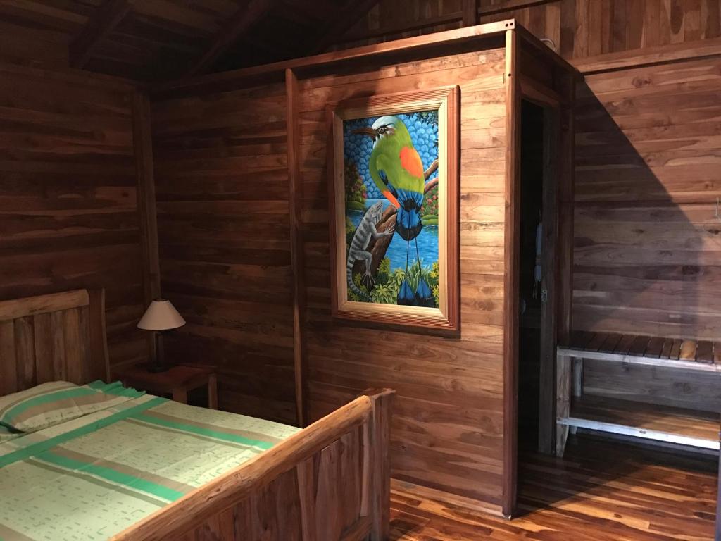 Postel nebo postele na pokoji v ubytování Hotel Cabanas La Teca