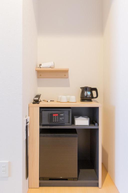 Kuchyň nebo kuchyňský kout v ubytování Hotel M's Plus Shijo Omiya