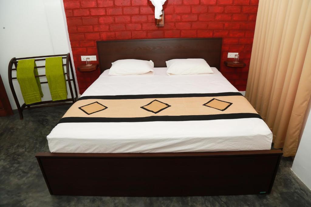 Postel nebo postele na pokoji v ubytování Four season Guest house