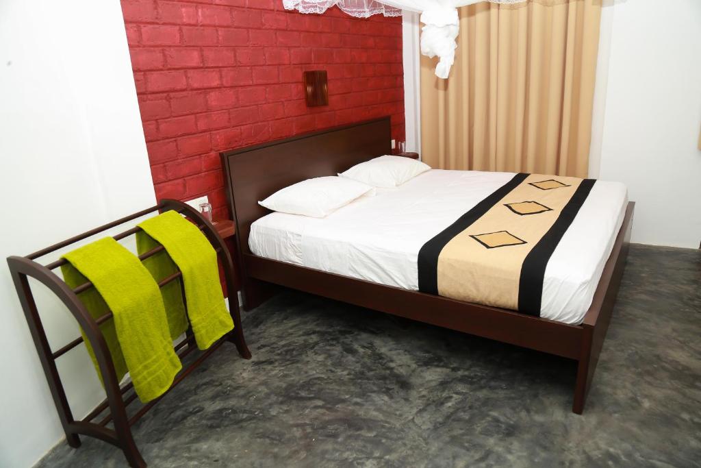 Postel nebo postele na pokoji v ubytování Four season Guest house