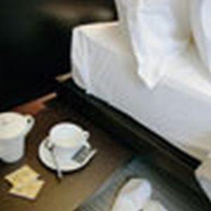 Postel nebo postele na pokoji v ubytování Art Hotel Udine