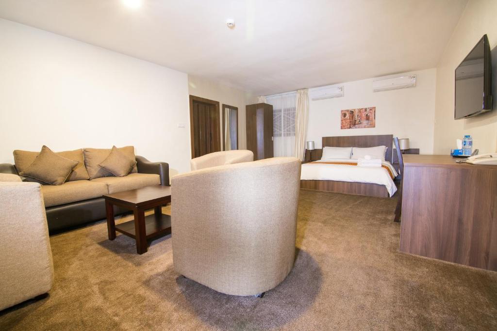 Postel nebo postele na pokoji v ubytování Sinclair Guest House