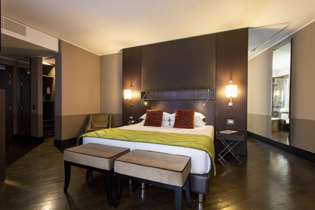 Postel nebo postele na pokoji v ubytování Rome Times Hotel