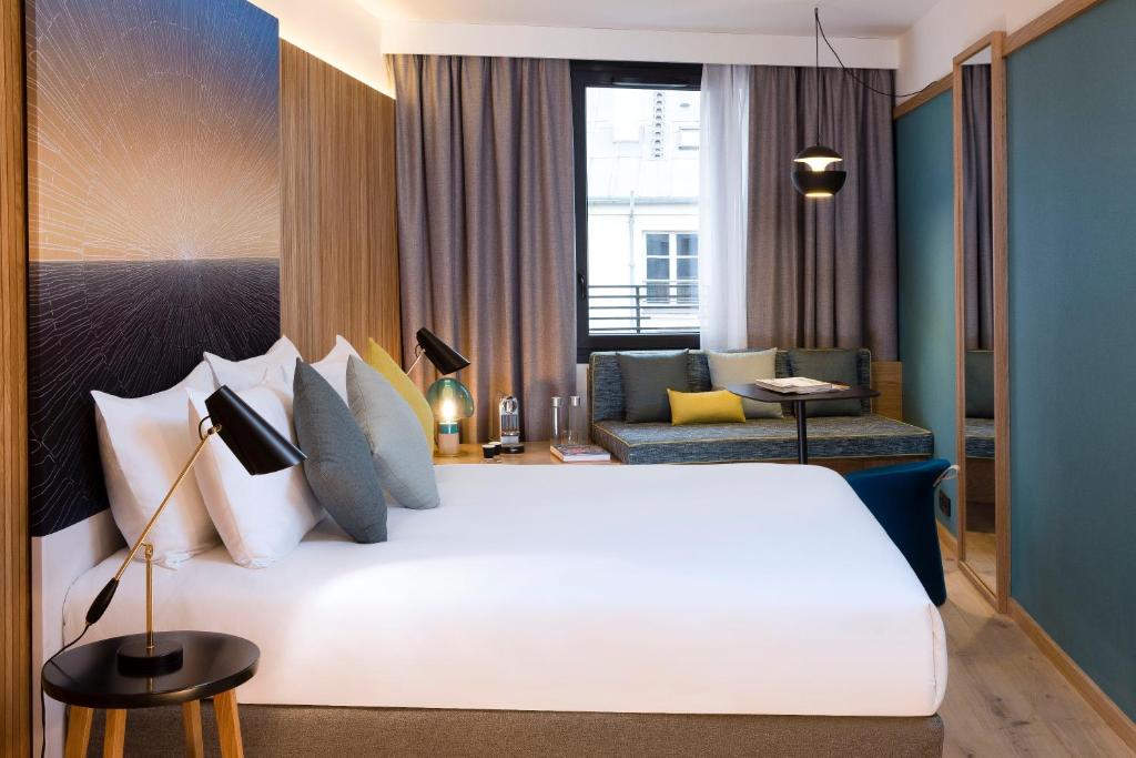 Katil atau katil-katil dalam bilik di Drawing Hotel