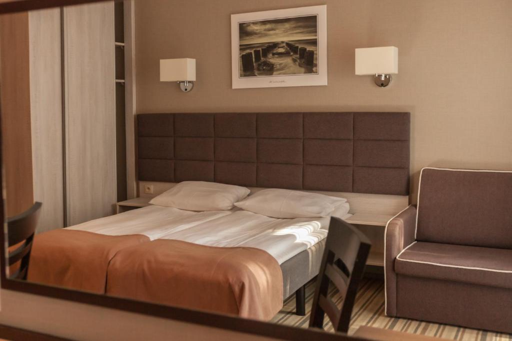 Postel nebo postele na pokoji v ubytování Waterside Resort