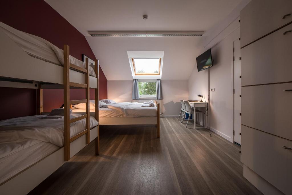 Postel nebo postele na pokoji v ubytování Auberge des 3 Fontaines