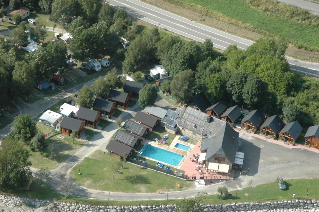 an aerial view of a house with a swimming pool at Camping Era Yerla D'arties in Arties