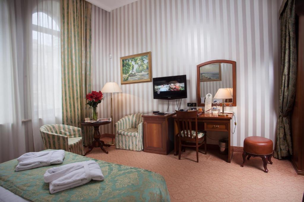 Postel nebo postele na pokoji v ubytování Hotel Otrada