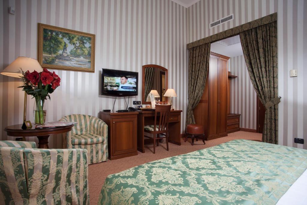 TV a/nebo společenská místnost v ubytování Hotel Otrada