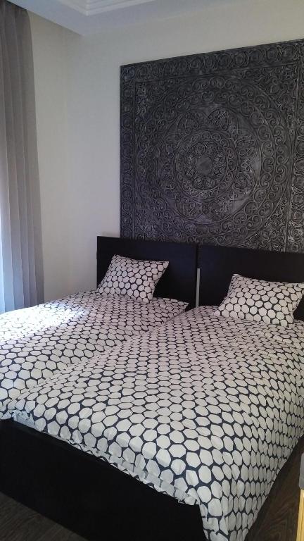 Postel nebo postele na pokoji v ubytování Appartement Privé au Vizir Center Marrakech