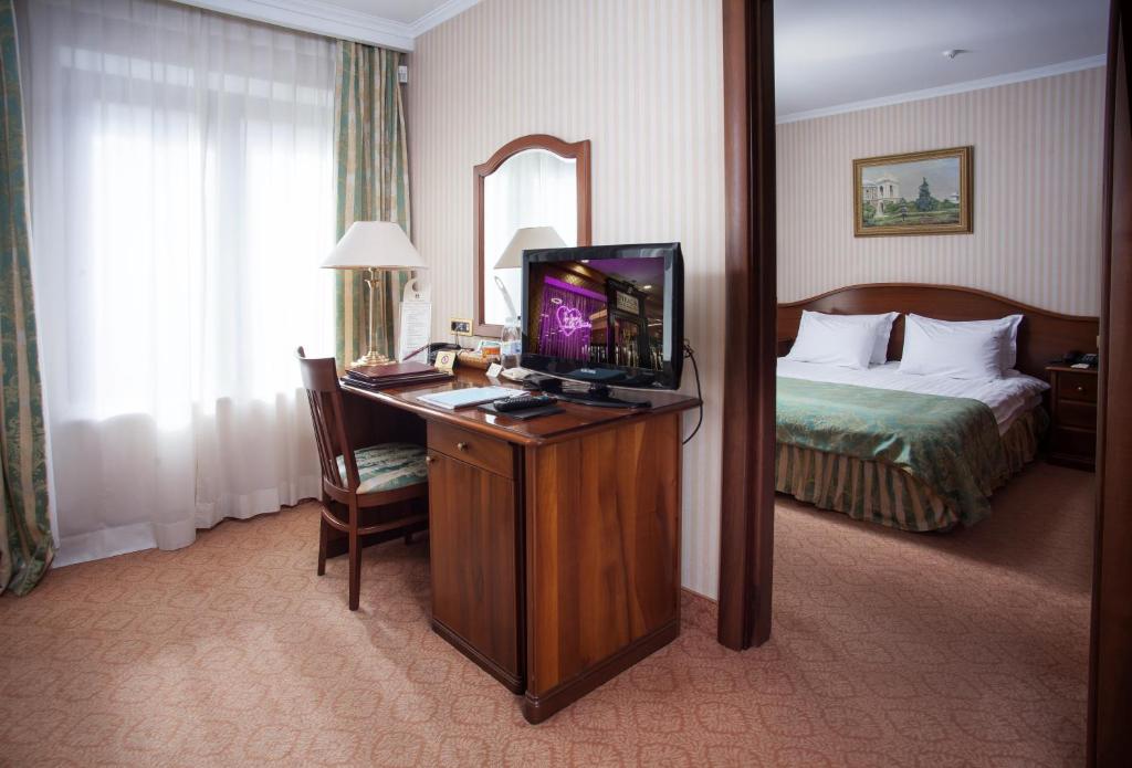 Postel nebo postele na pokoji v ubytování Hotel Otrada