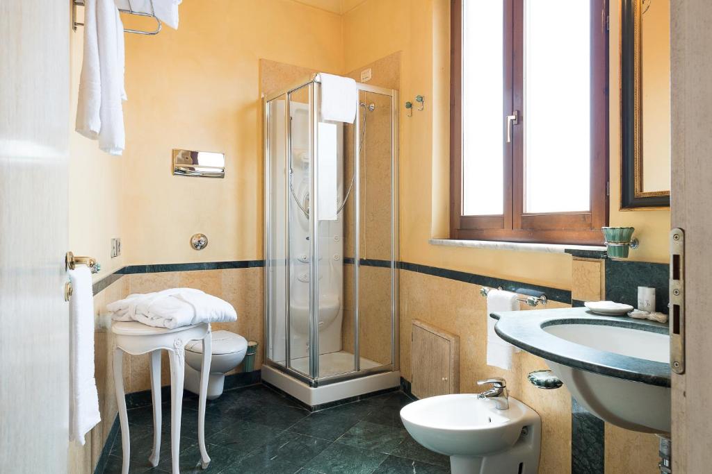 Koupelna v ubytování Hotel Vecchio Borgo