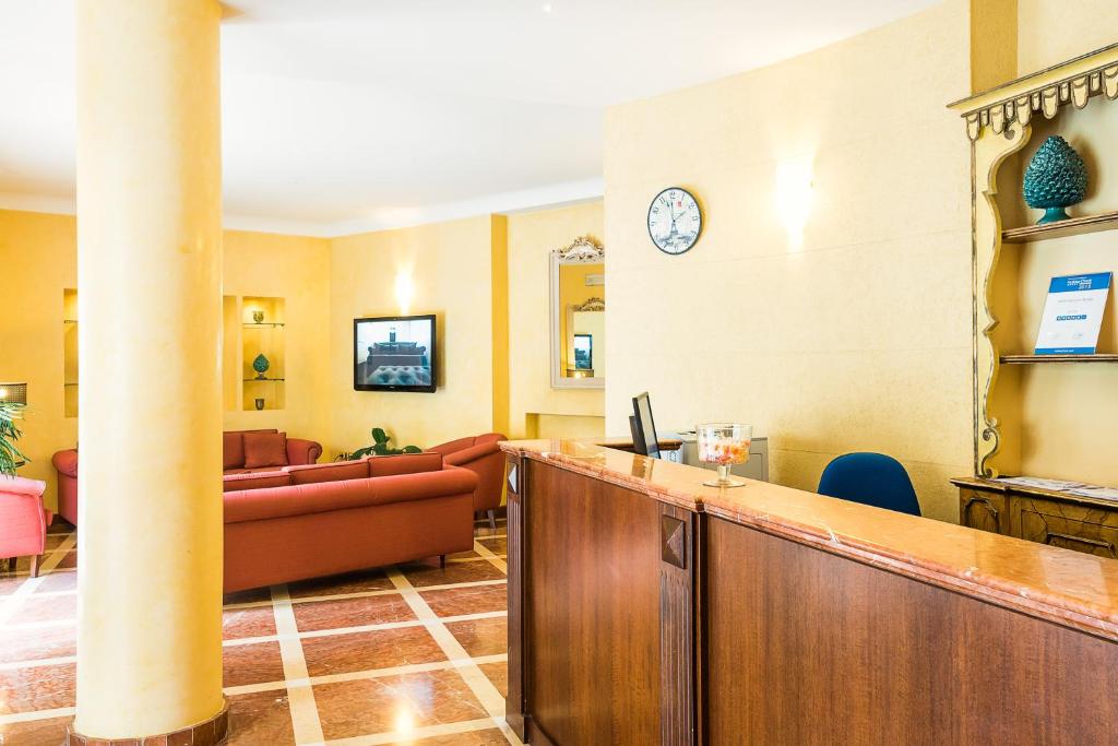 TV a/nebo společenská místnost v ubytování Hotel Vecchio Borgo