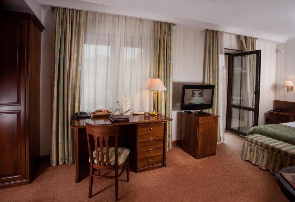 Postel nebo postele na pokoji v ubytování Hotel Otrada