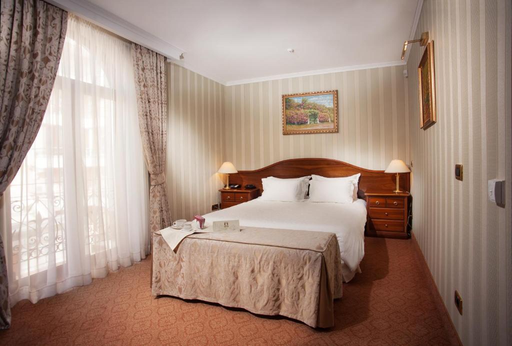 Postel nebo postele na pokoji v ubytování Hotel Otrada