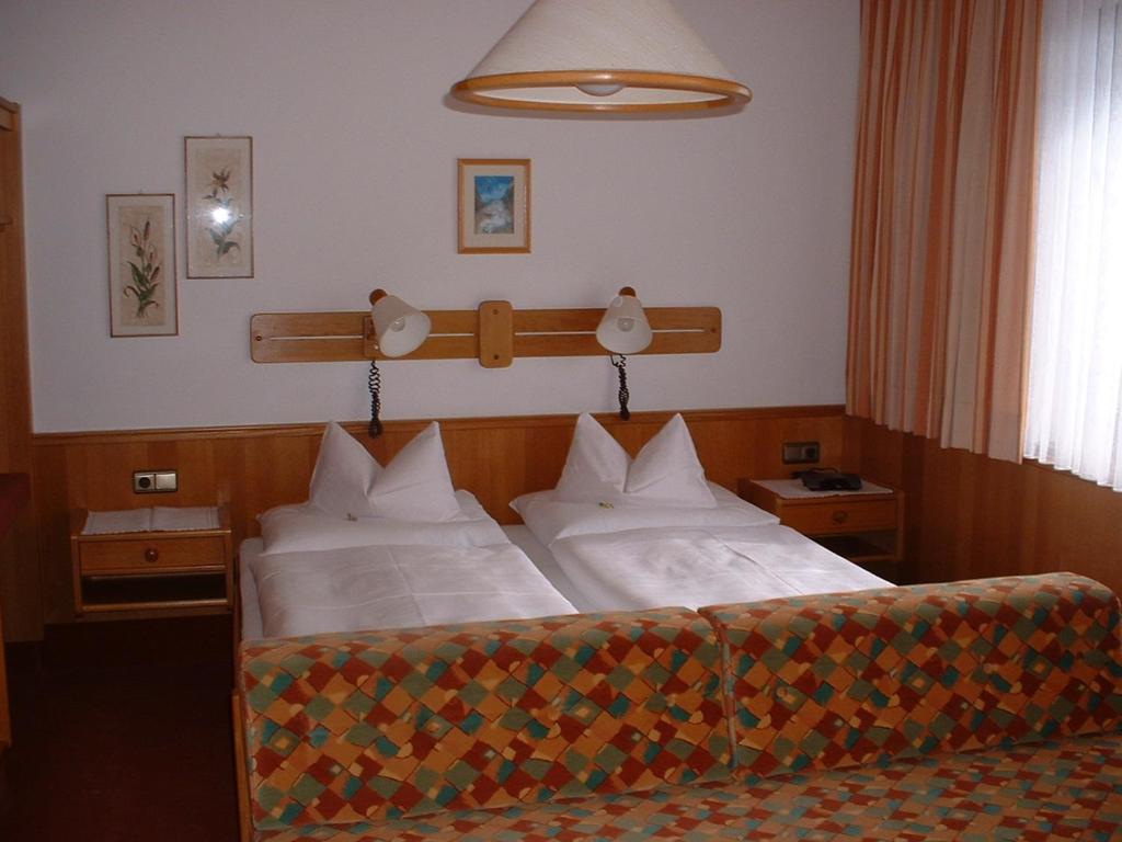 Postel nebo postele na pokoji v ubytování Haus Maria Leiter