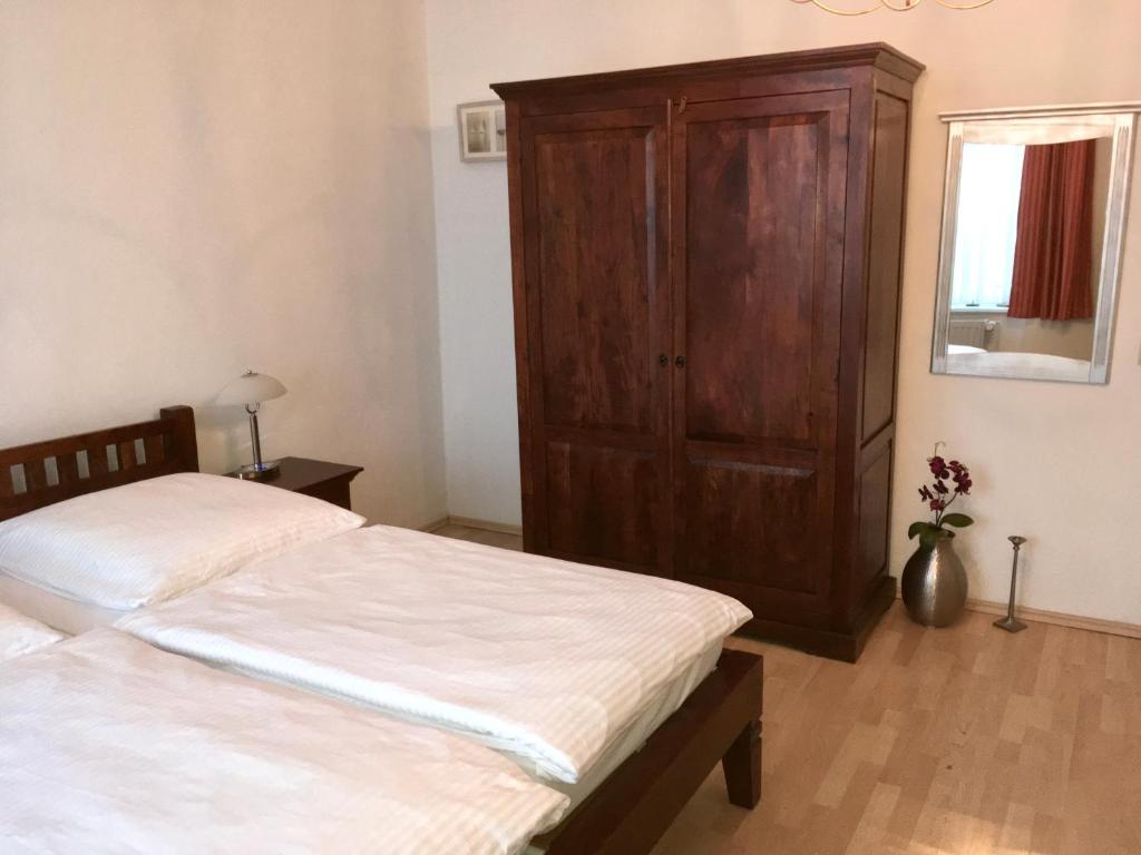 Postel nebo postele na pokoji v ubytování Villa Bergfried