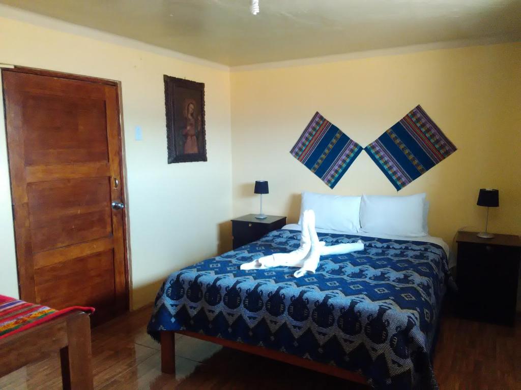 Postel nebo postele na pokoji v ubytování Kurumi Hostel