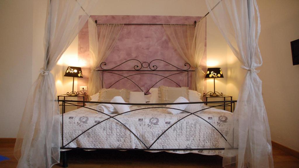 Кровать или кровати в номере Ridolfi Guest House