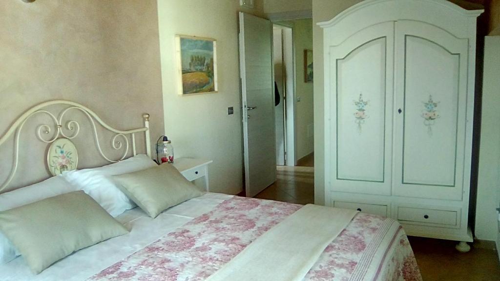 Postel nebo postele na pokoji v ubytování Art Gallery B&B Foresteria