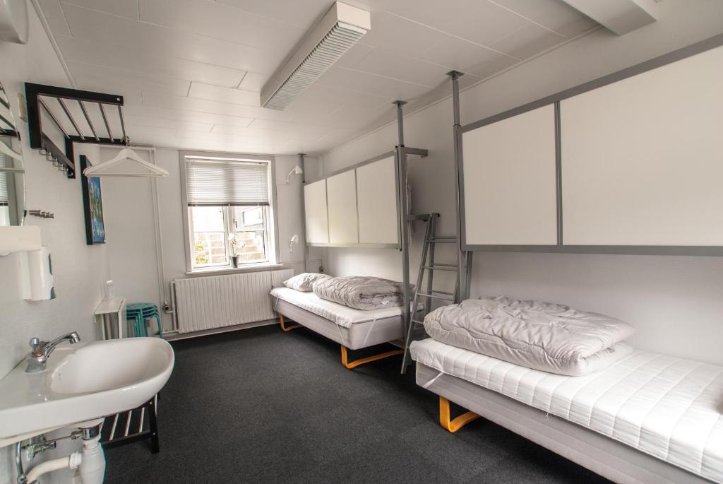Postel nebo postele na pokoji v ubytování Danhostel Kolding