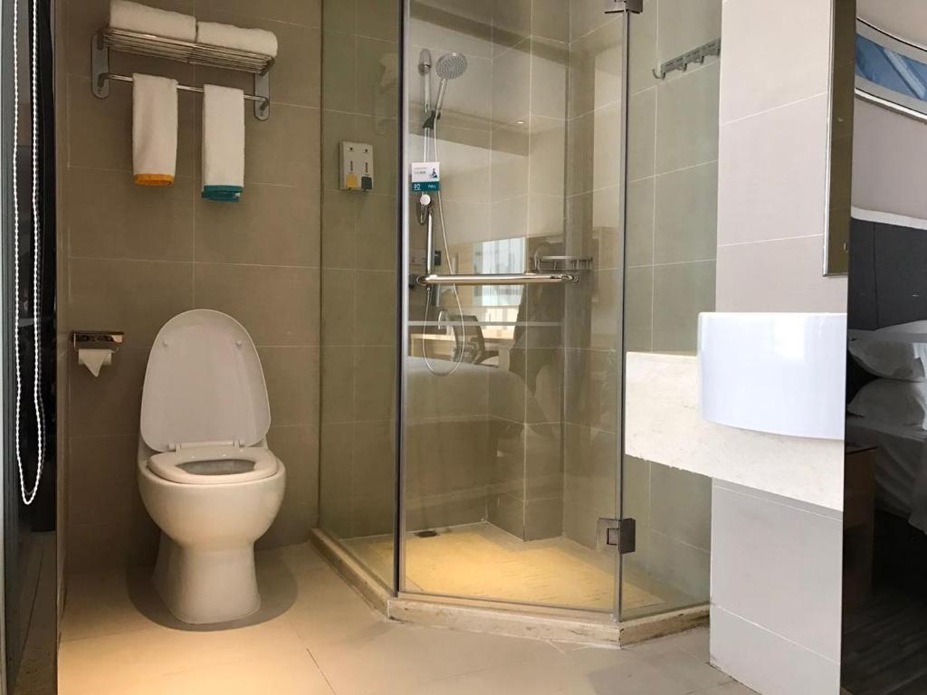 Koupelna v ubytování Hotel Pomelo Premier 西柚臻选武昌站酒店