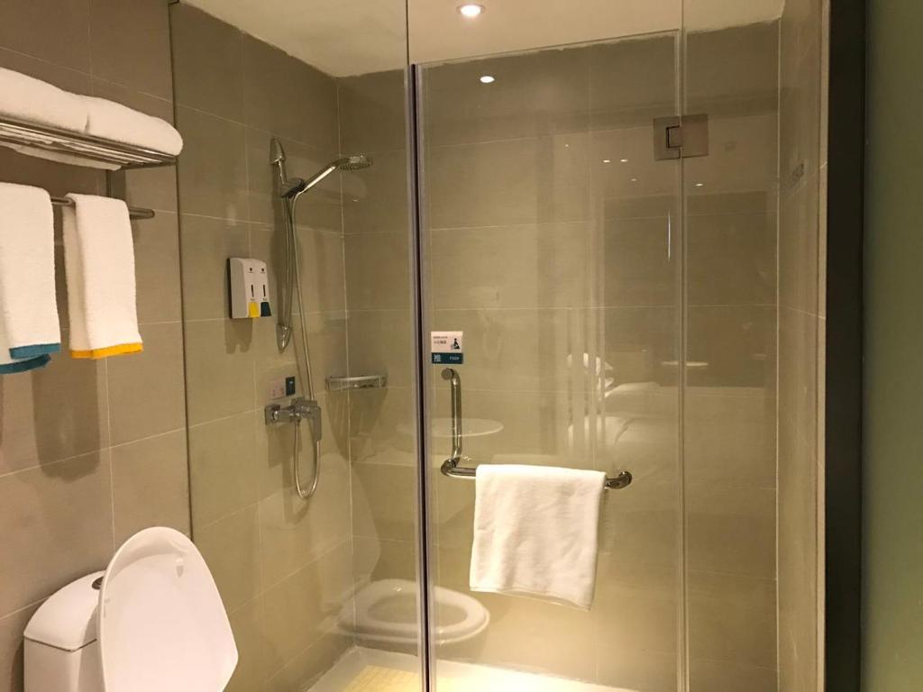Koupelna v ubytování Hotel Pomelo Premier 西柚臻选武昌站酒店