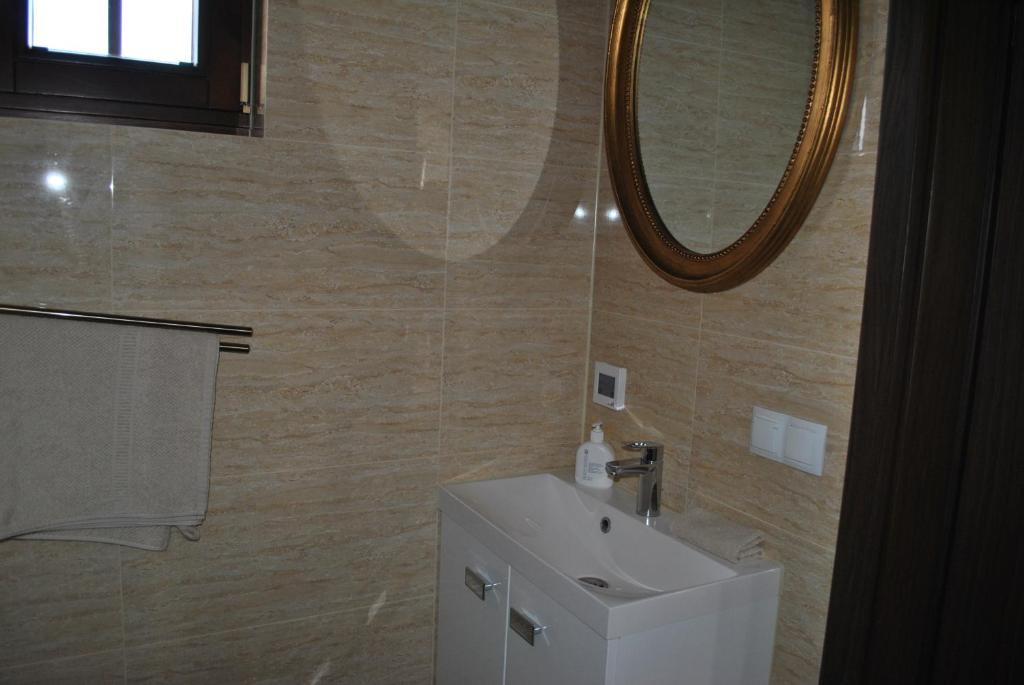 Kúpeľňa v ubytovaní Lesne Domki VIP
