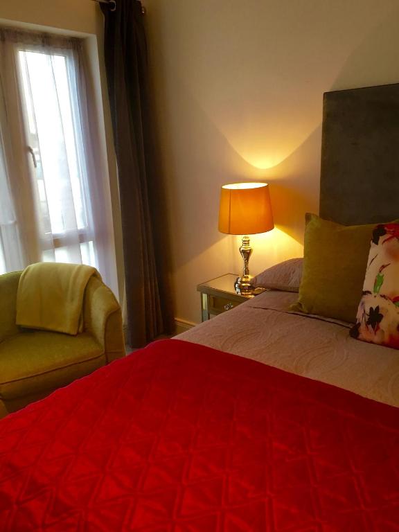 Postel nebo postele na pokoji v ubytování Hazelbrook Killarney