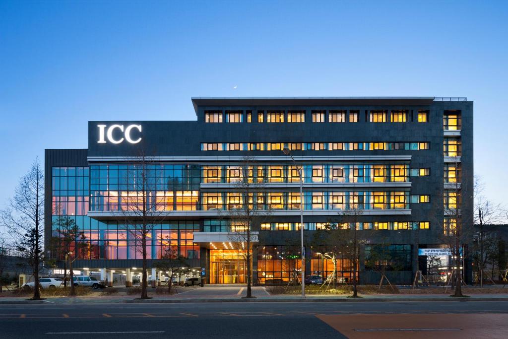 a large office building with the icc sign on it at Hotel Icc in Daejeon