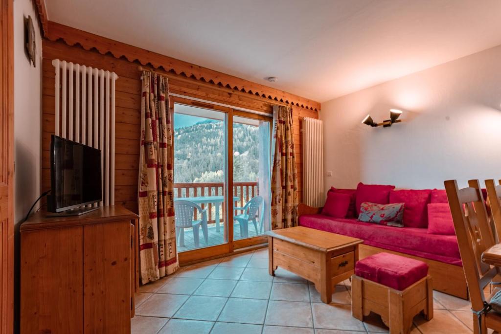 Résidence Roselend - Charmant appartement de 3 pièces situé dans une résidence au village du Chantel, proche des pistes et avec piscine. MAE-2474