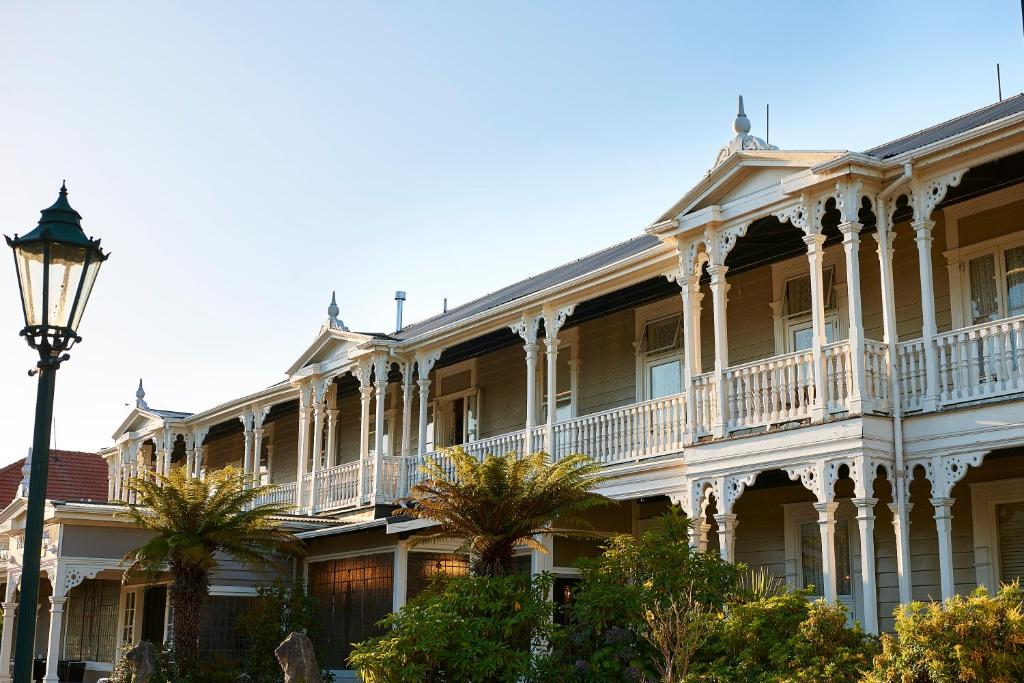 a building with a street light in front of it at Prince's Gate Hotel in Rotorua