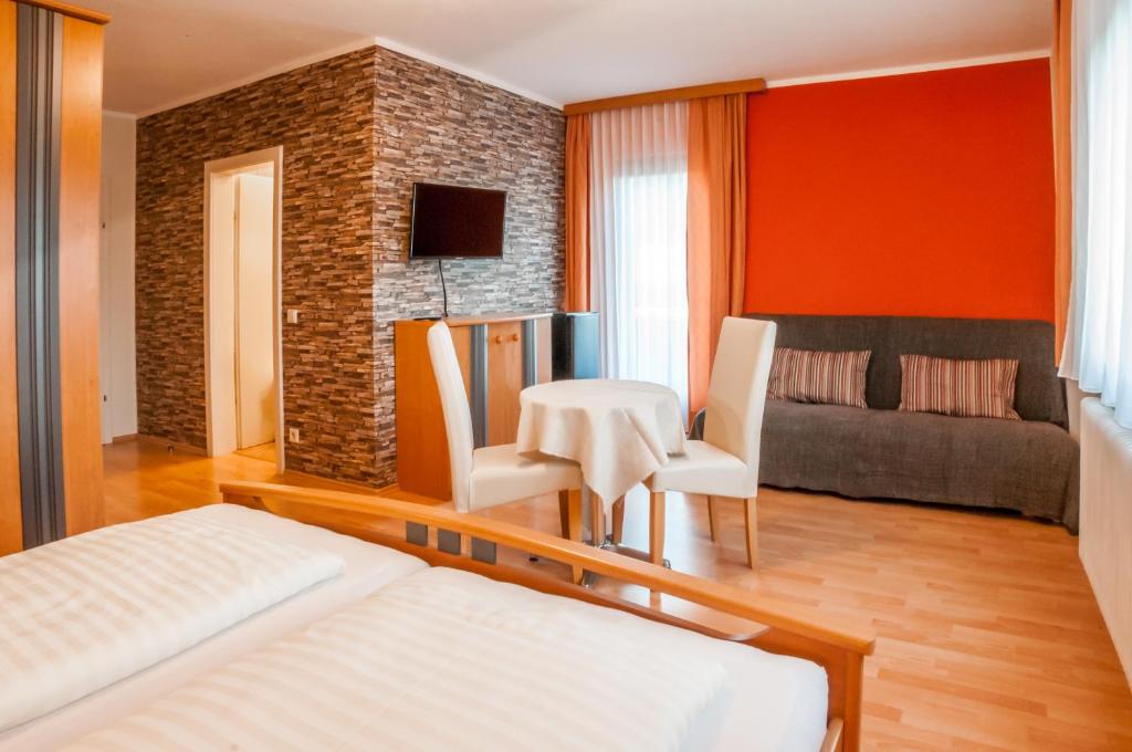 Postel nebo postele na pokoji v ubytování Waldpension Schiefling am See
