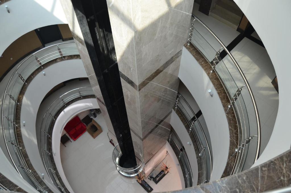 an overhead view of a spiral staircase in a building at Massayef Al Khobar 2 in Al Khobar