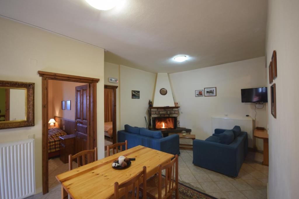 Televízia a/alebo spoločenská miestnosť v ubytovaní Mountain House