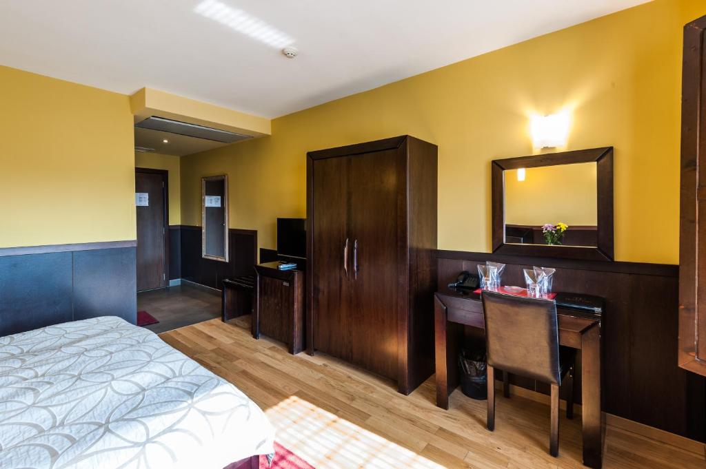 Postel nebo postele na pokoji v ubytování Hotel Ego - Free Parking - Top Central Location