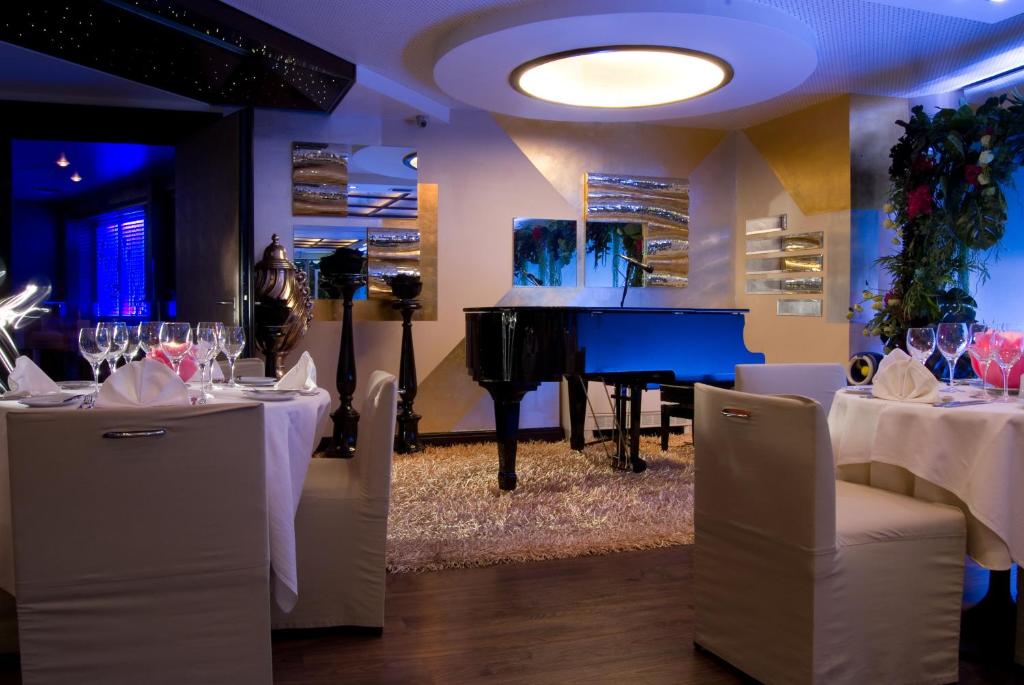Posezení v ubytování The Athenian Callirhoe Exclusive Hotel